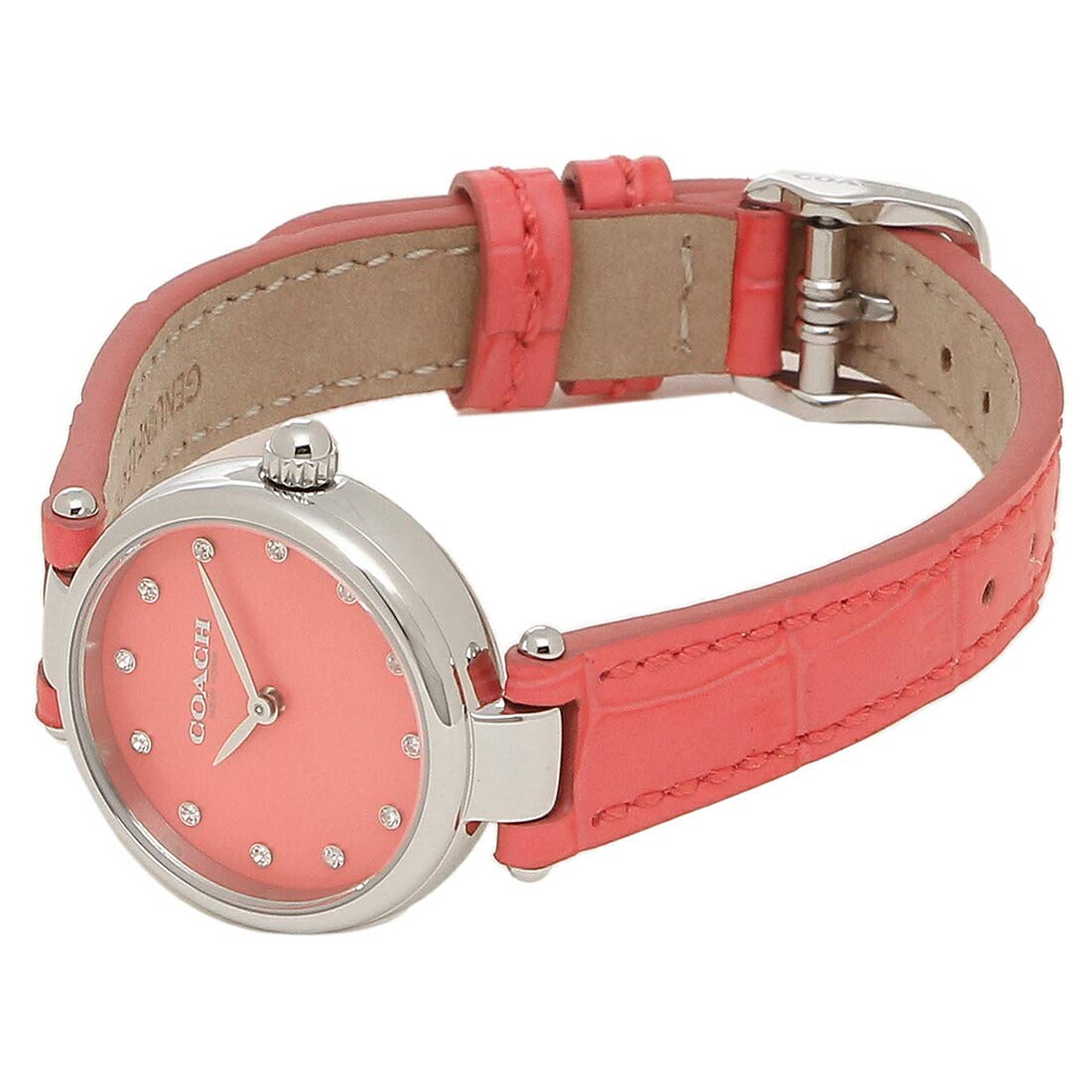 Coach women's watch on wrist displaying pink dial and pink leather strap with tan suede interior