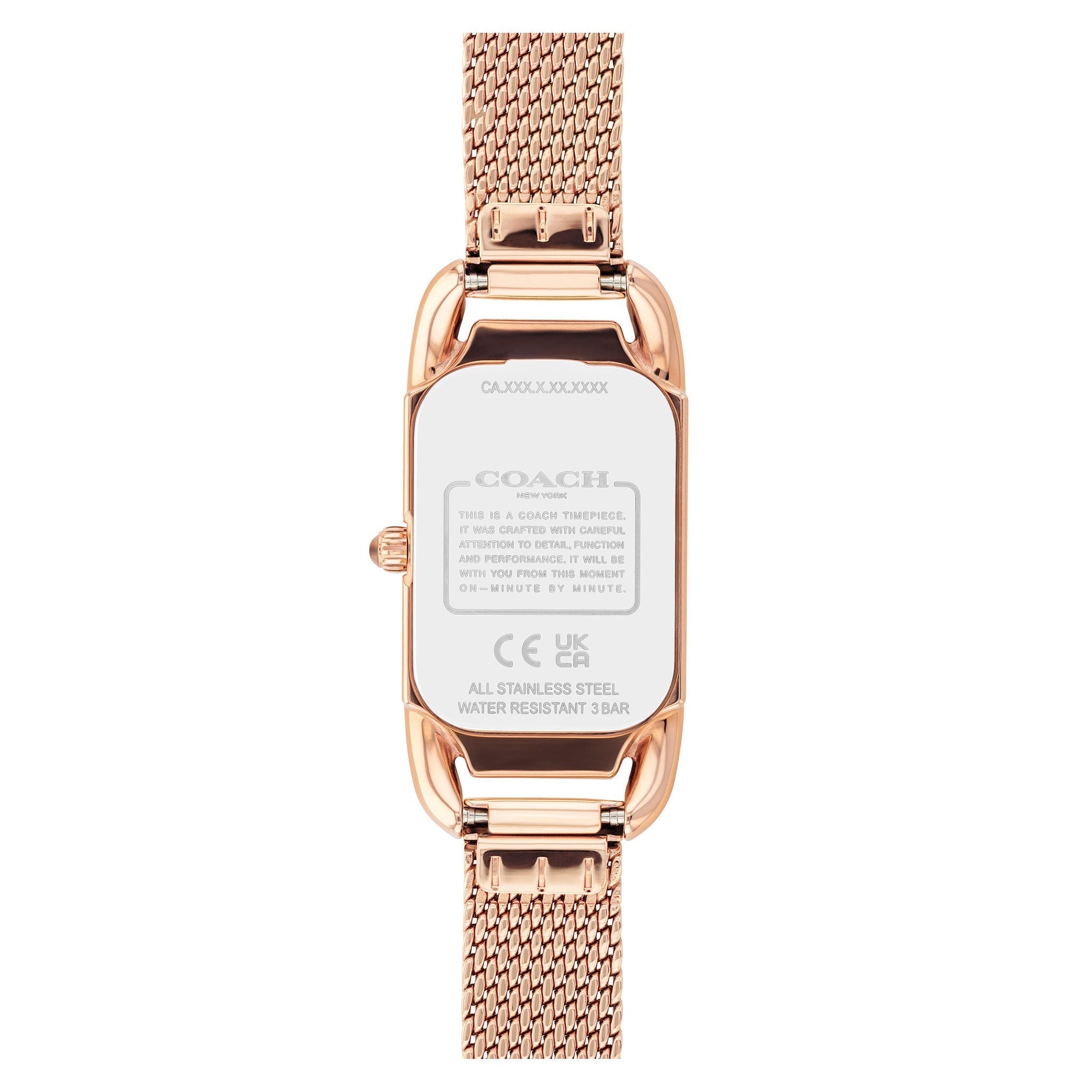 Coach watch caseback showing model number, regulatory marks, and stainless steel construction