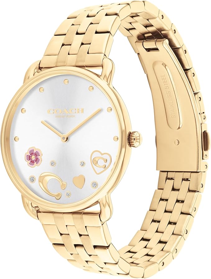 Coach women's watch side view showing gold metal strap and white dial with decorative charms