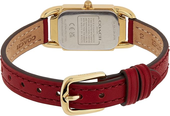 Red leather bracelet with gold buckle and tan inner lining, back view showing Coach branding