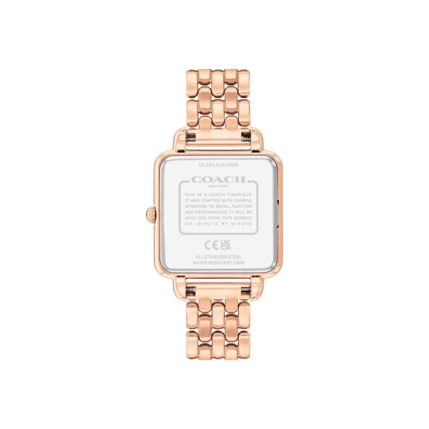 Coach Cass watch caseback showing Coach branding, specifications, and rose gold-tone case