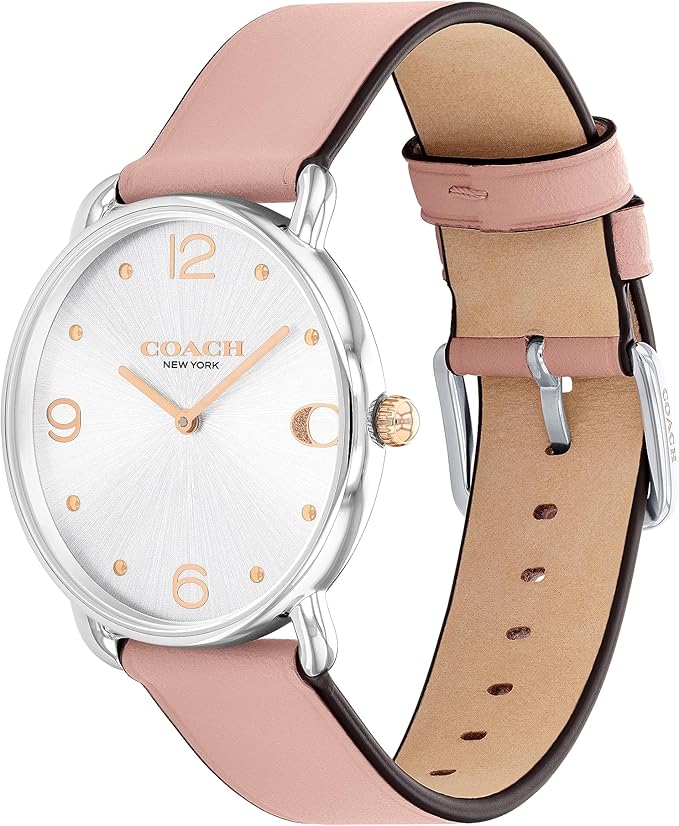 Coach ELLIOT watch showing white oval dial and pink leather strap with tan interior lining