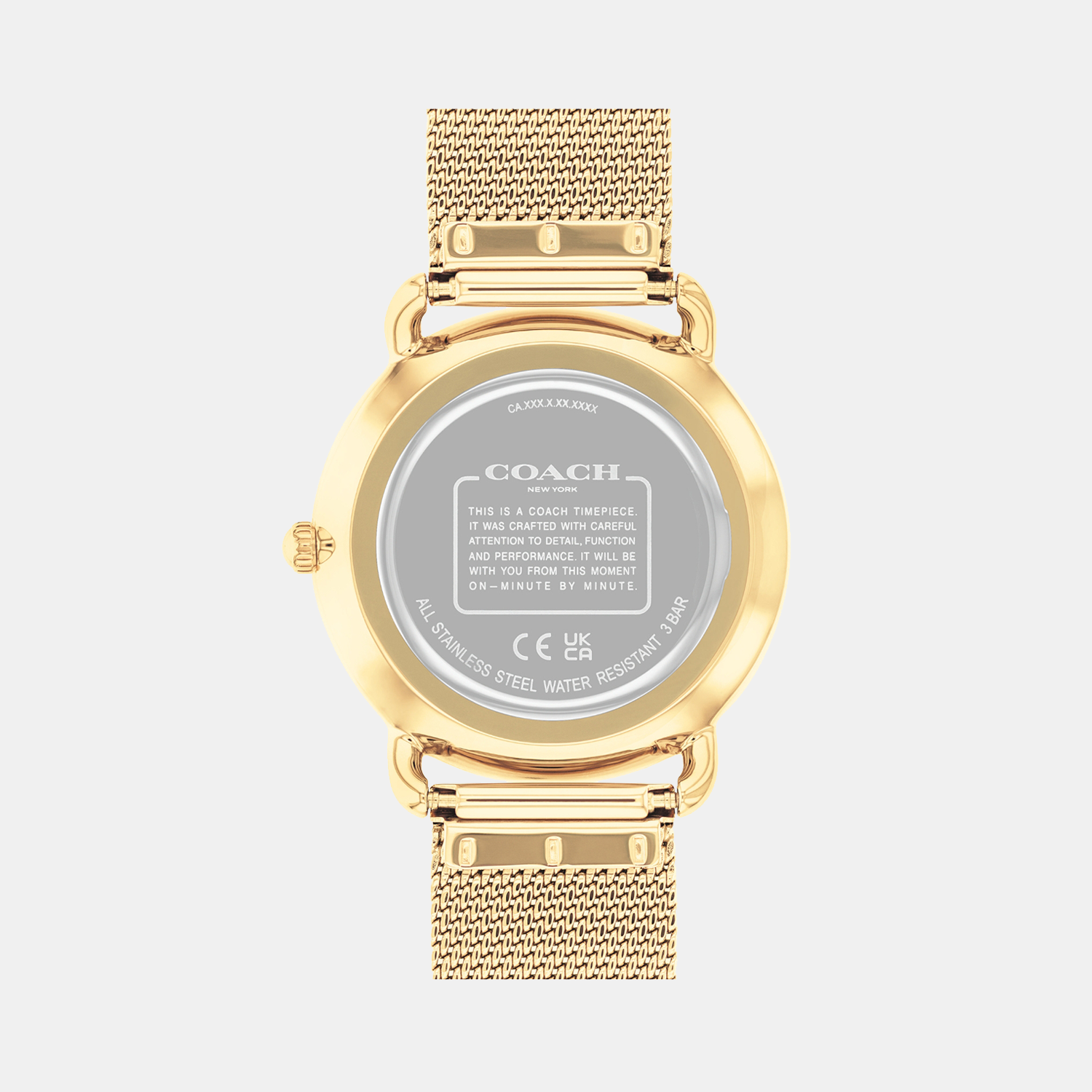 Coach Elliot watch caseback showing gold tone case and mesh bracelet