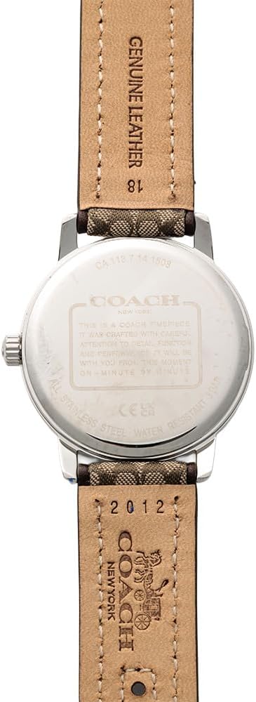Coach Grand watch caseback showing engraved Coach branding and serial number details