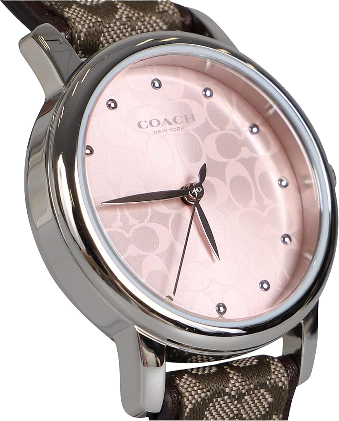 Pink dial with Coach logo, diamond hour markers, and silver hands on Coach watch