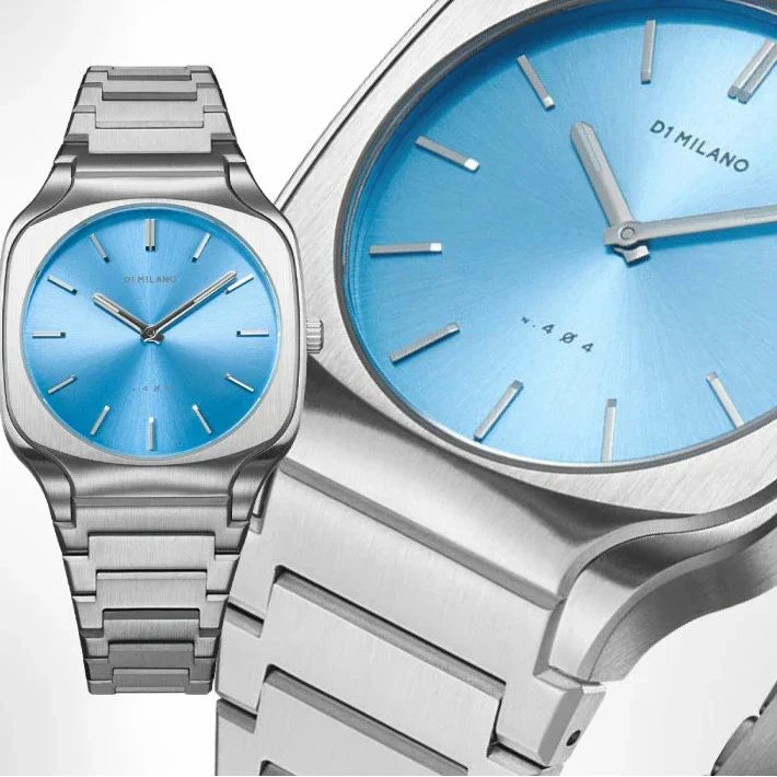 Close-up detail of D1 Milano Square Maldives sea blue dial with index markers and branding
