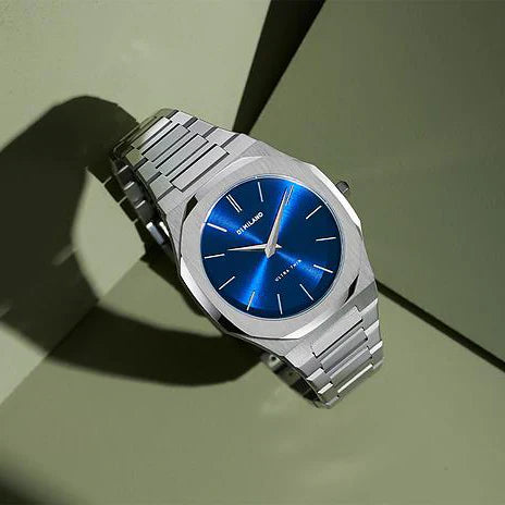 D1 MILANO UTBJ09 watch worn on wrist showing silver case and blue dial