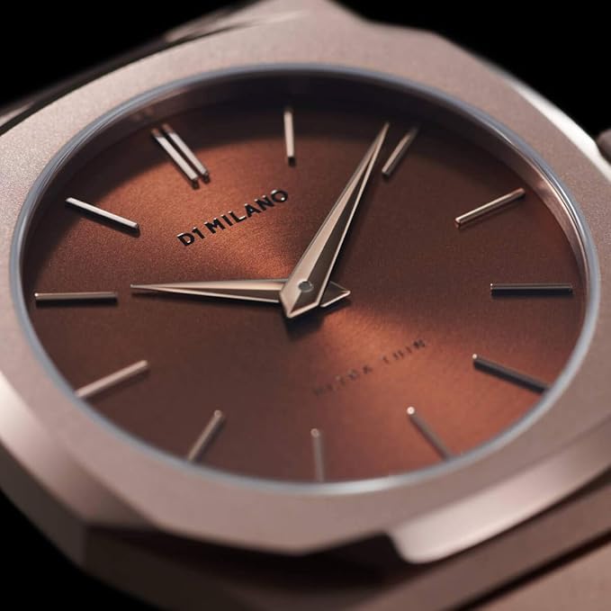 Close-up of D1 Milano UTBJ10 brown dial with rose gold hands and markers