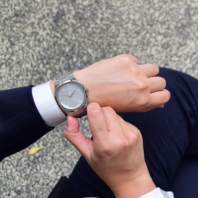 D1 Milano UTBJ23 ultra-thin watch on wrist showing minimal profile and silver dial