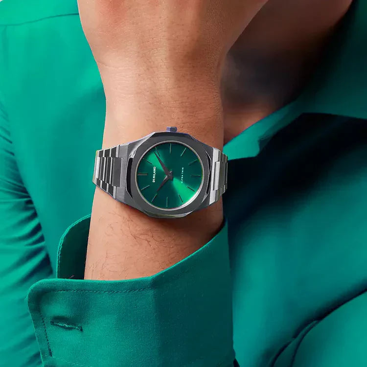 D1 Milano UTBJ37 watch on wrist showing green dial and steel case