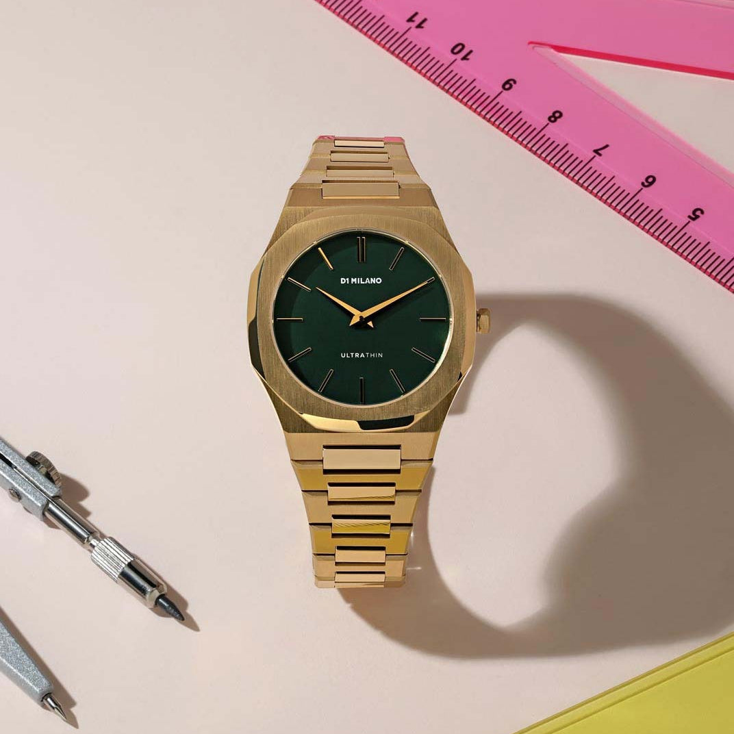 D1 Milano UTBL18 women's ultra-thin watch with green dial on table