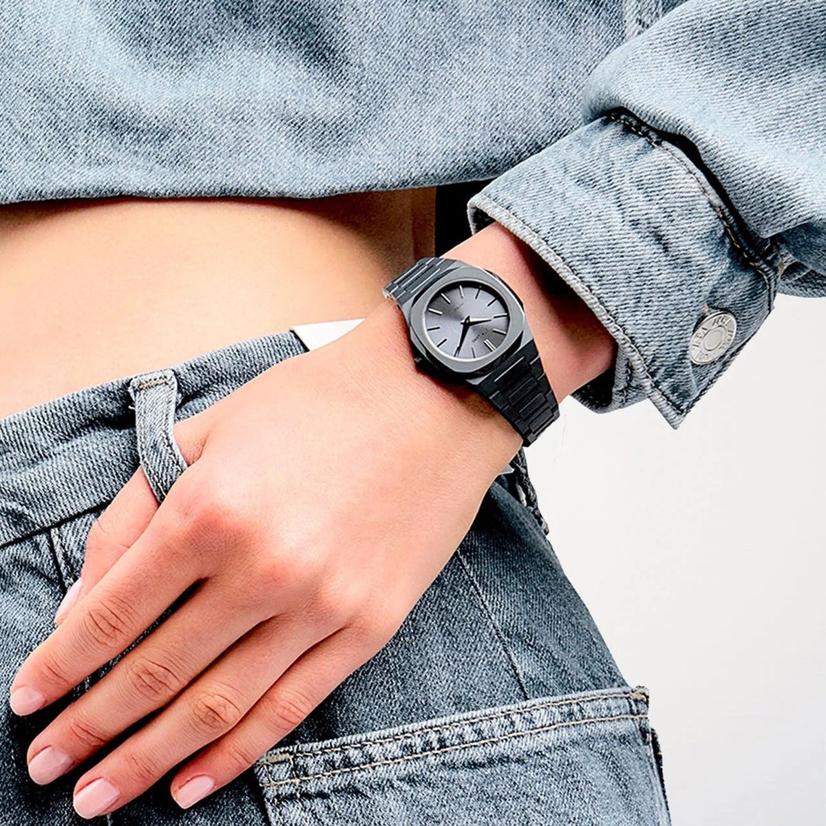 D1 Milano Ultra Thin Ultimate Grey 30mm watch worn on wrist with denim clothing