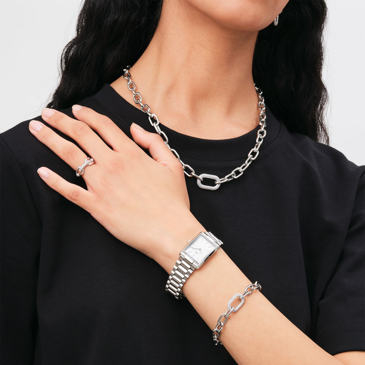 Daniel Wellington The Bound Link watch worn on wrist with link bracelet