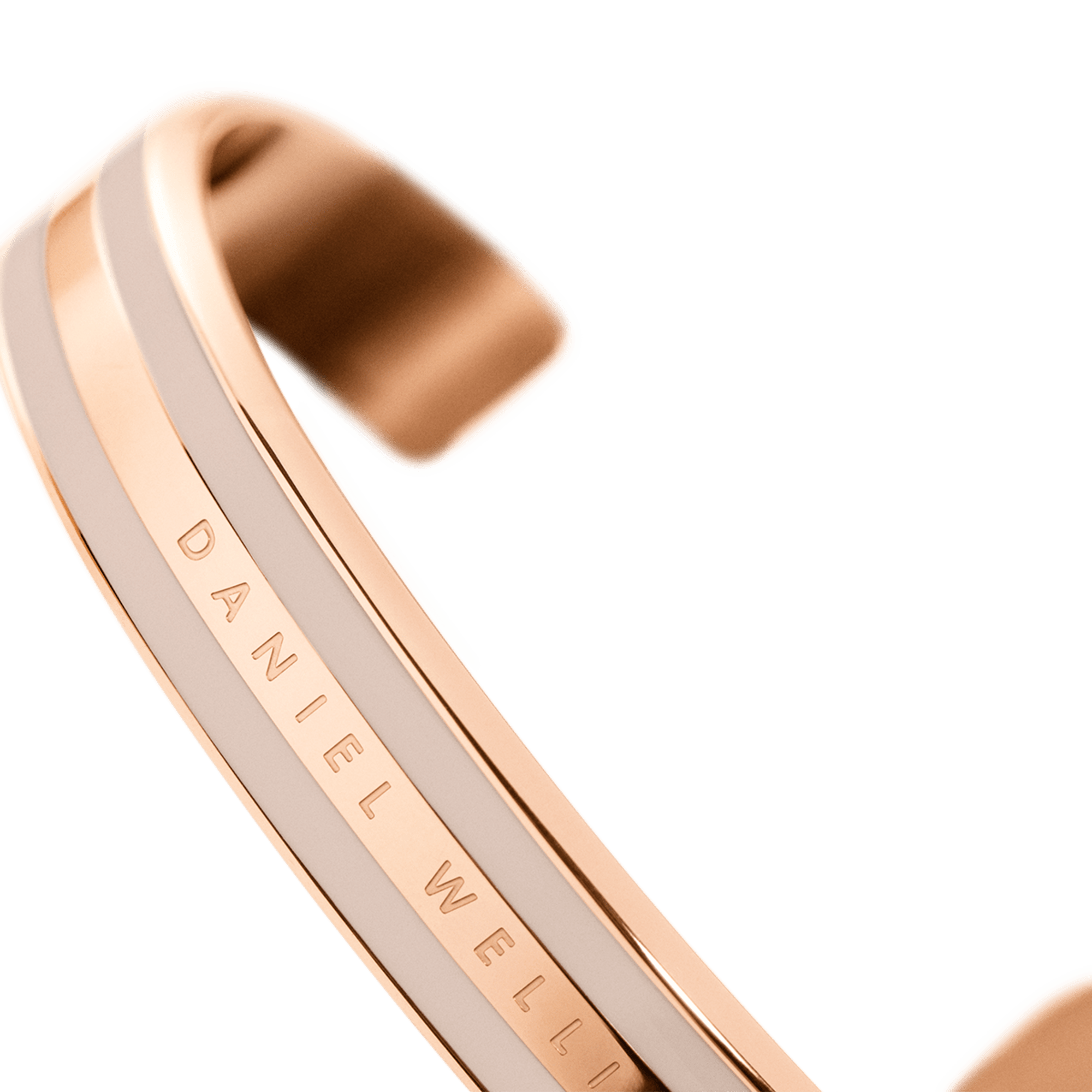 Side profile of Daniel Wellington Classic Desert Sand rose gold bracelet with white band
