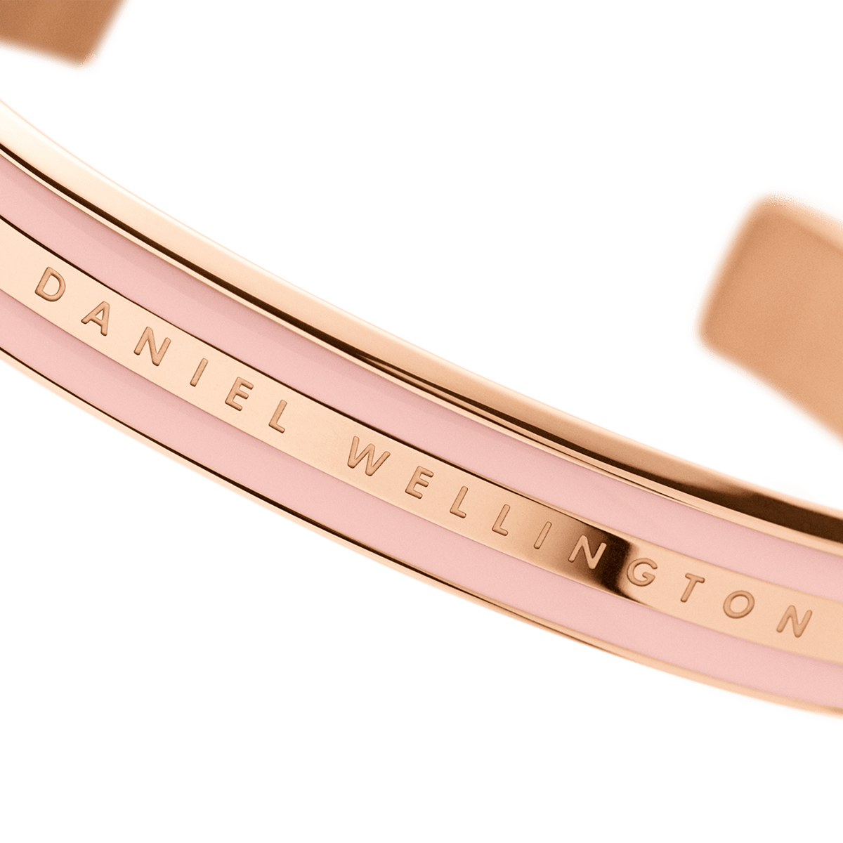 Close-up detail of Daniel Wellington text engraving on bracelet