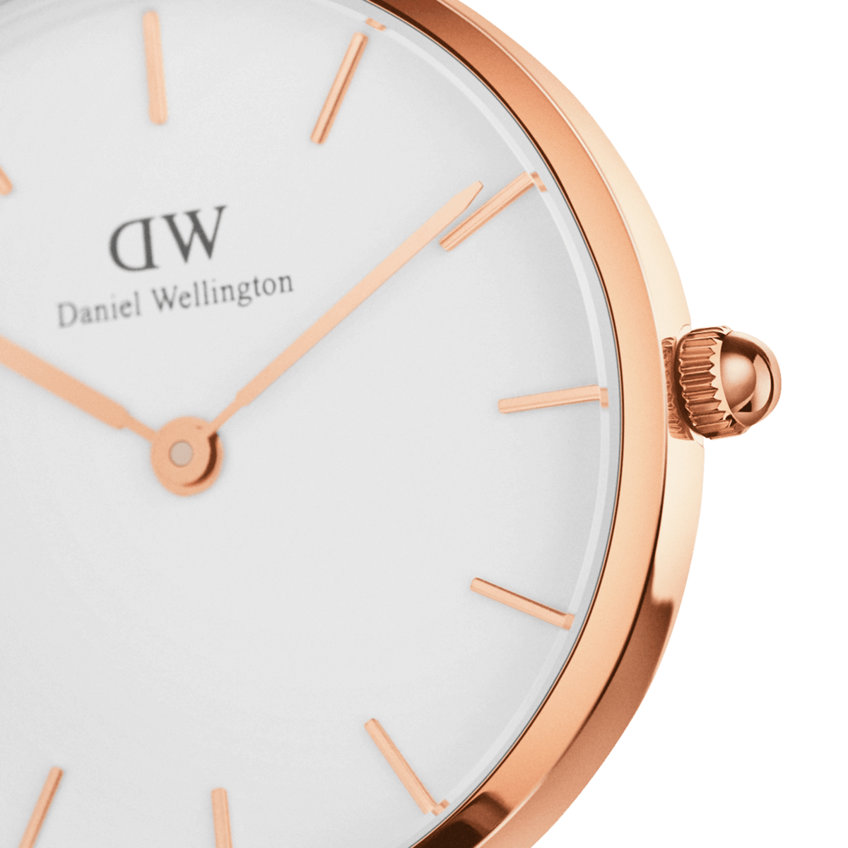 Close-up of white dial with rose gold hands and hour markers, Daniel Wellington logo