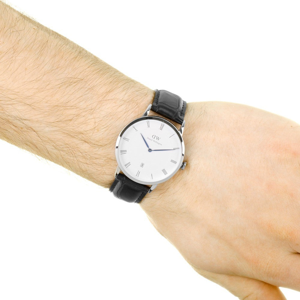 Daniel Wellington Dapper Reading 38mm watch worn on wrist with black leather strap