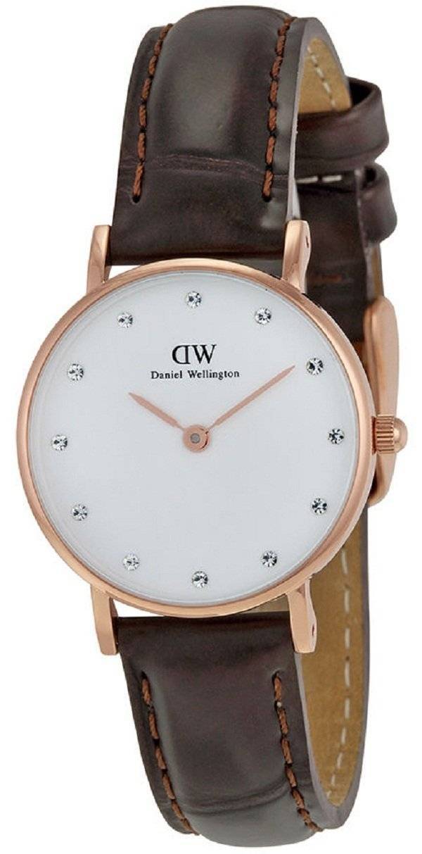 Daniel Wellington Classy York watch displayed at angle showing white dial and brown crocodile-embossed leather strap