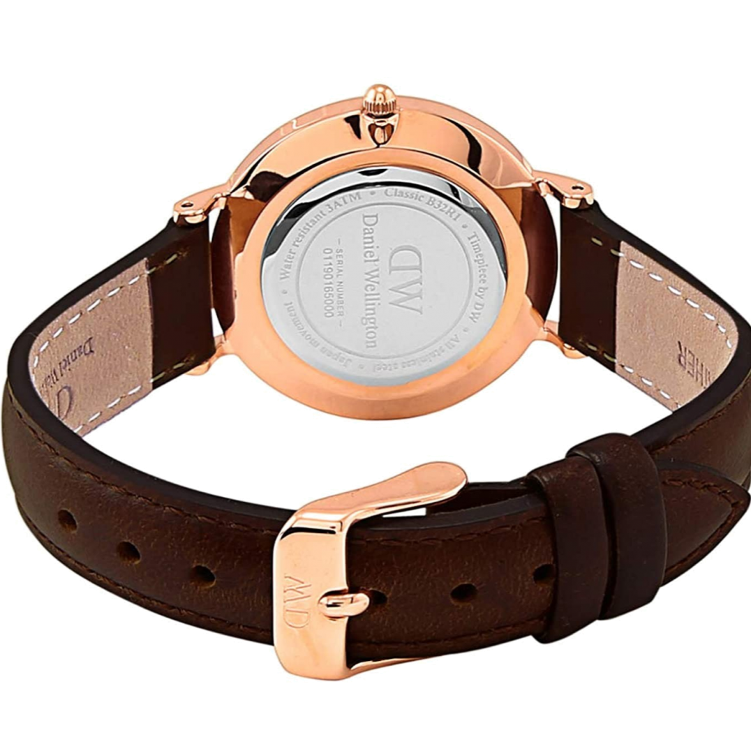 Daniel Wellington Classy York caseback showing engraved text and rose gold case with brown leather strap