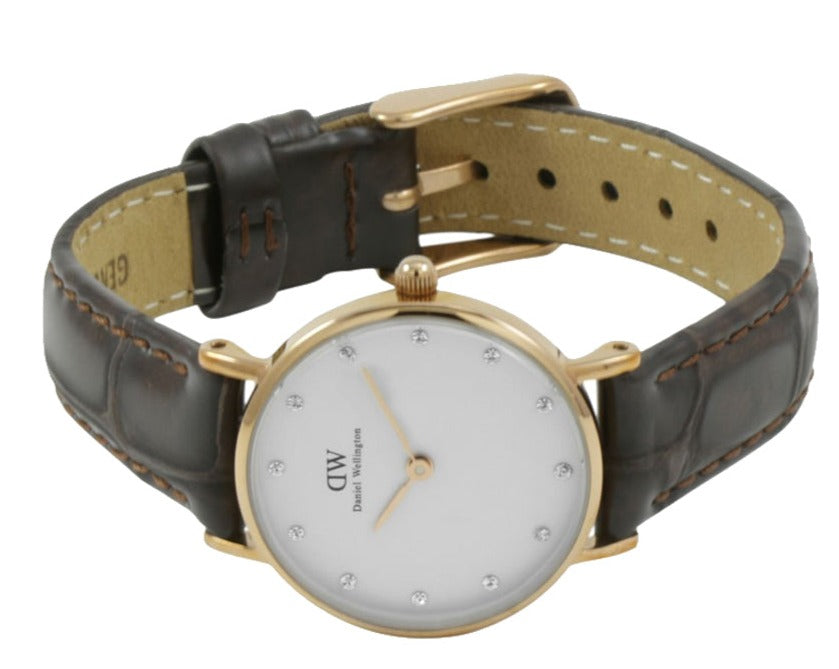 Daniel Wellington Classy York watch worn on wrist with brown leather strap and rose gold case