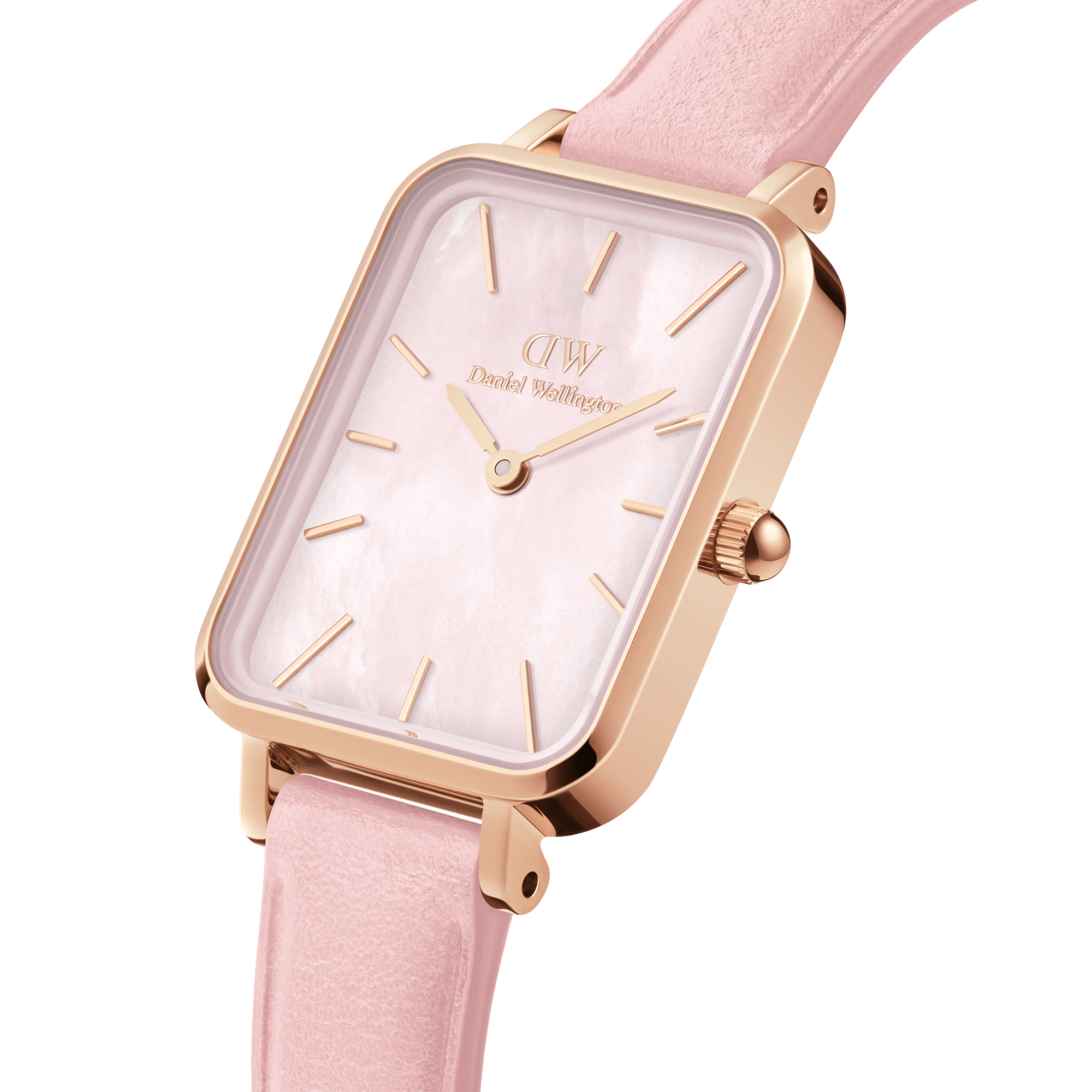 Daniel Wellington watch on wrist showing rose gold case, white dial and pink leather strap