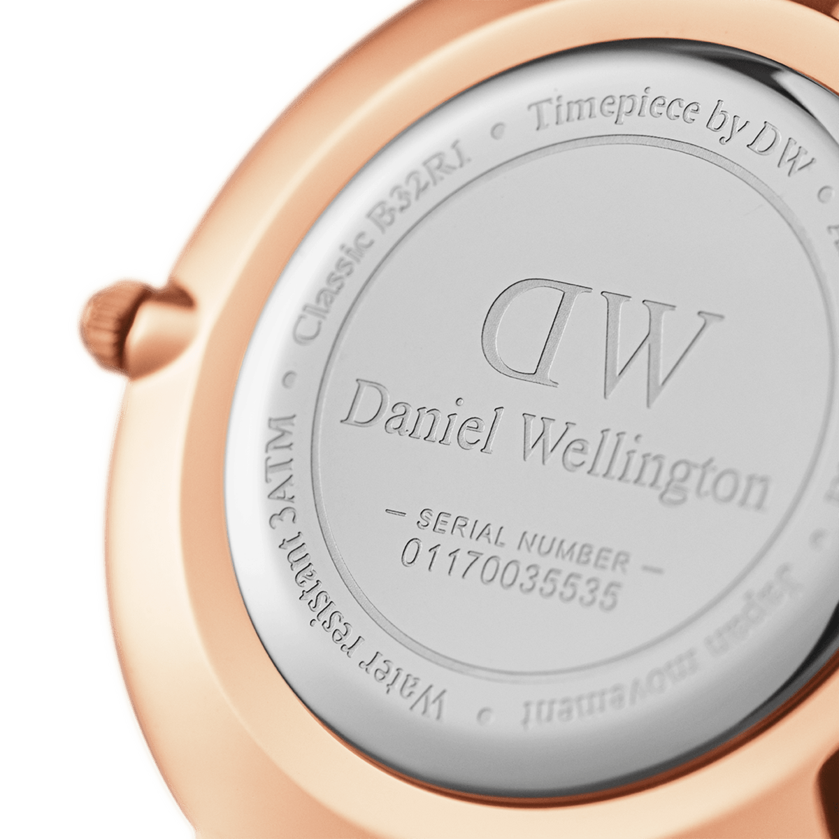 Watch caseback showing DW logo, Daniel Wellington branding and serial number engraving