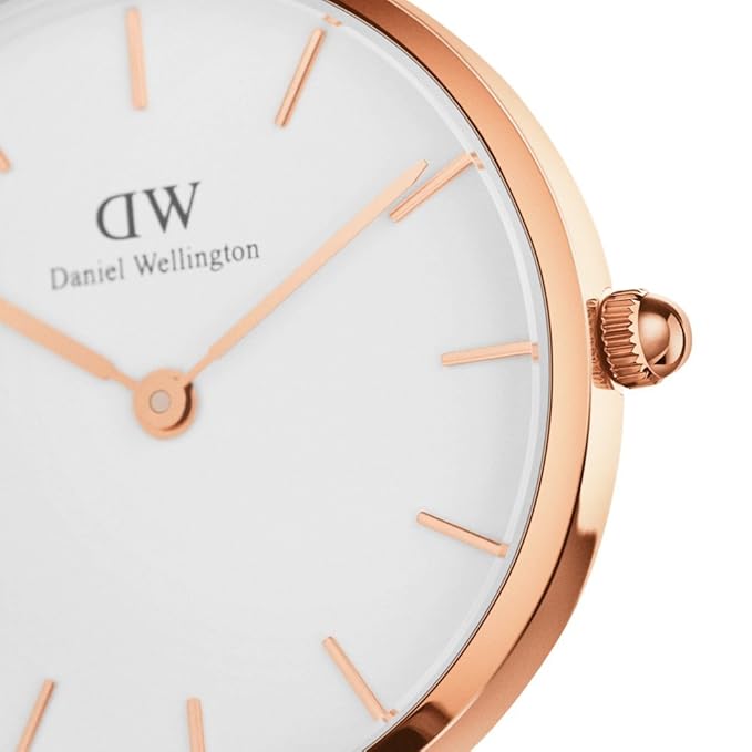 Side view showing rose gold case profile and crown details