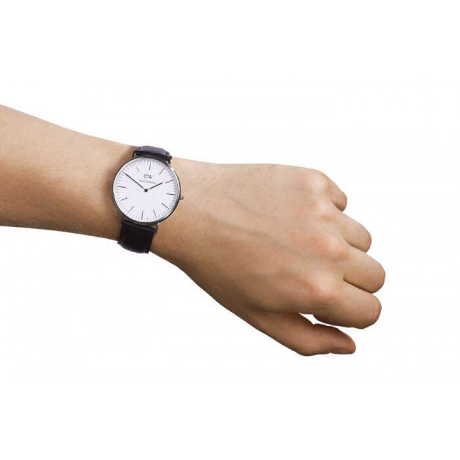 Daniel Wellington Sheffield 40mm watch on wrist showing minimalist white dial and black leather band