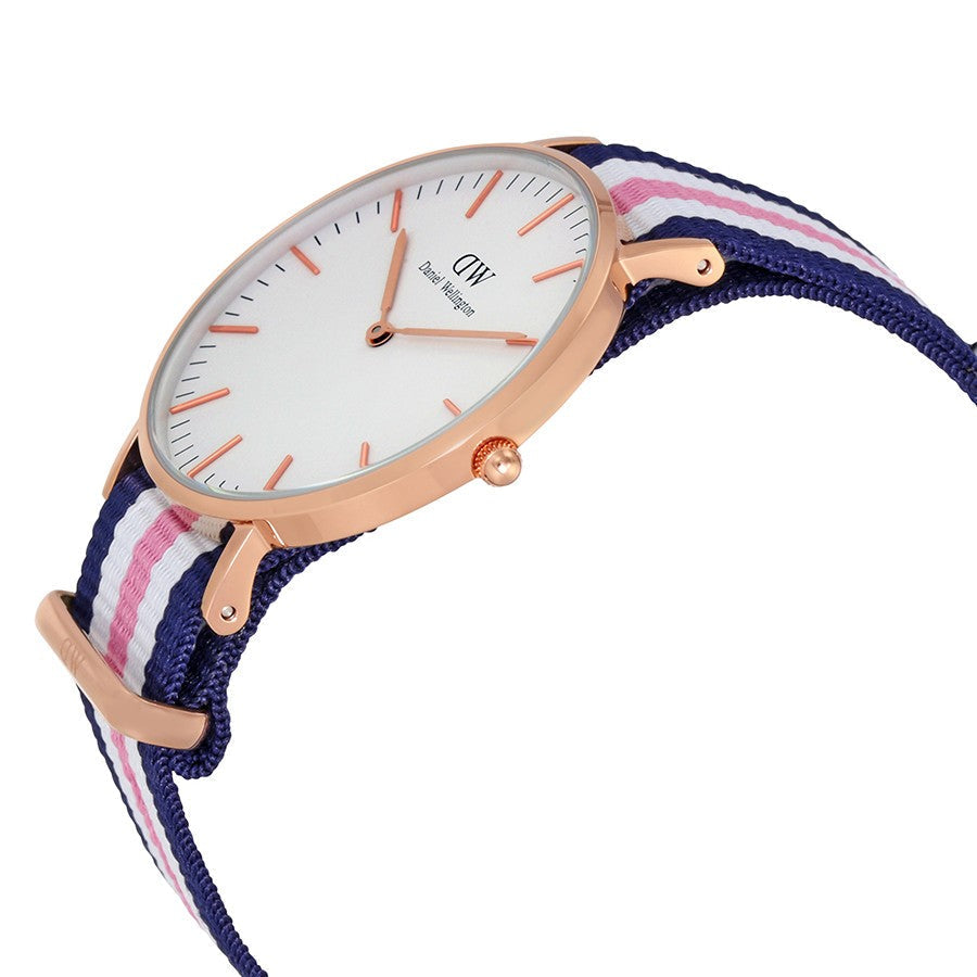 Side view of Daniel Wellington Southampton 36mm watch with rose gold case and navy pink white striped strap