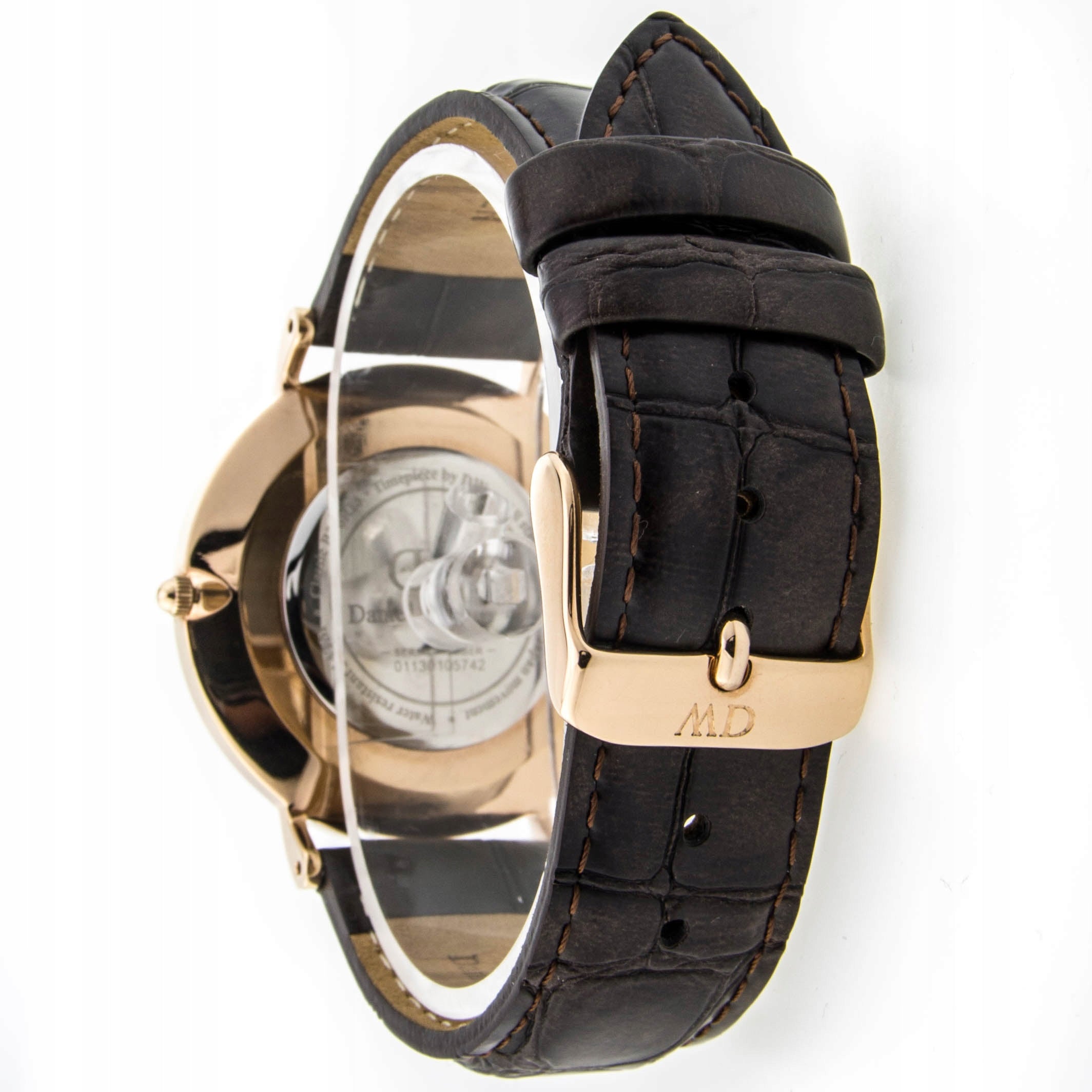 Daniel Wellington York watch back view displaying engraved caseback with rose gold and brown leather strap