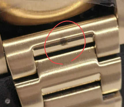 Diesel Mr. Daddy 2.0 watch side detail showing defect marking on gold strap