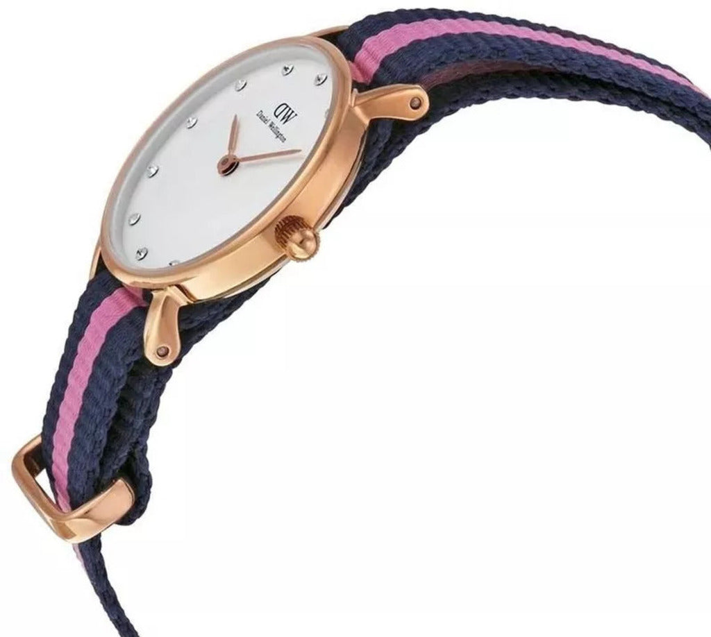 Side angle view of DW Classy Winchester with rose gold case and navy-pink striped canvas strap