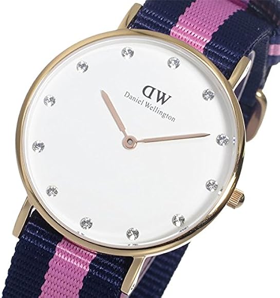 Daniel Wellington Classy Winchester on wrist with navy-pink striped fabric strap