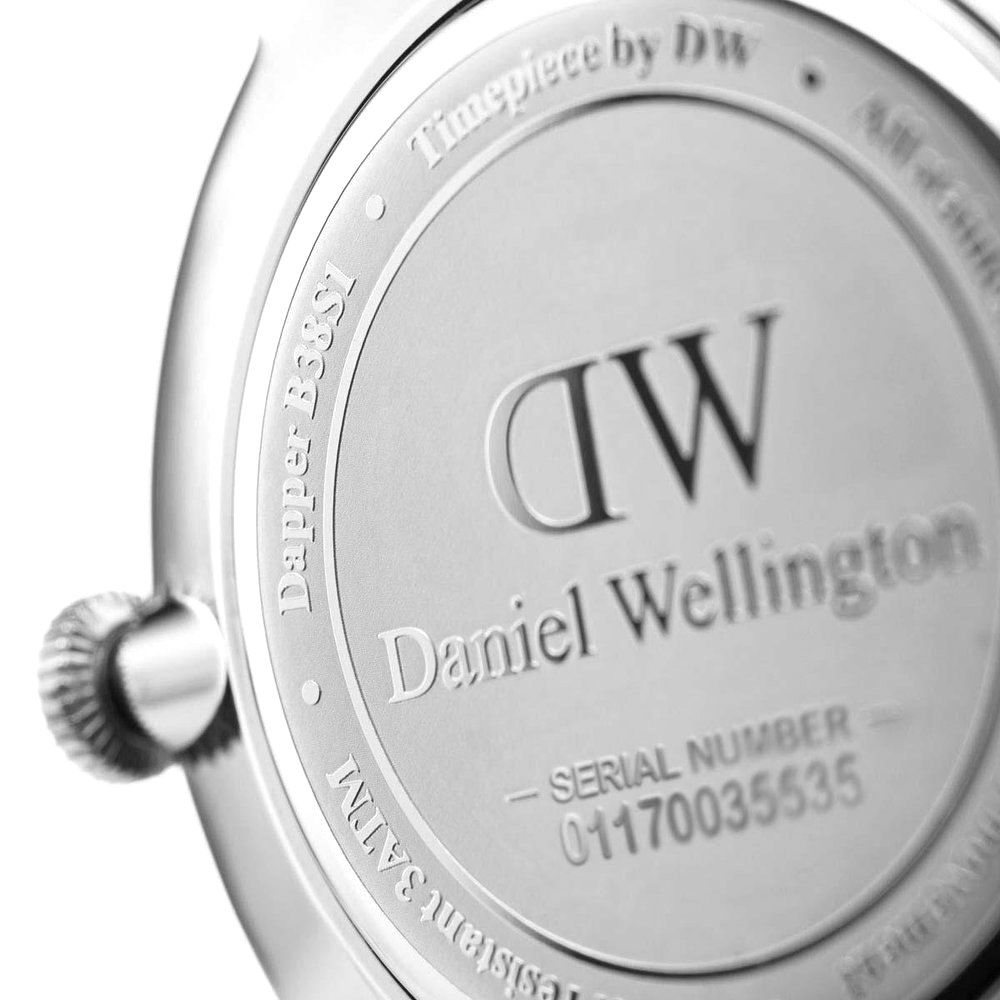 Caseback of Dapper Cornwall showing DW logo, Daniel Wellington engraving, and serial number