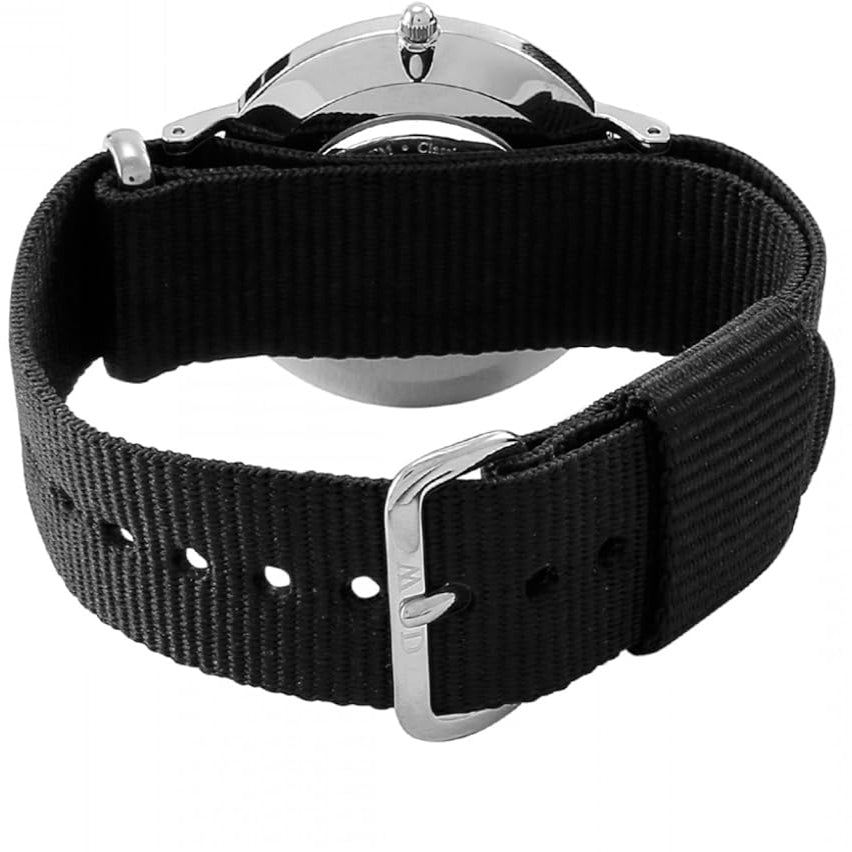 Daniel Wellington Dapper Cornwall watch on wrist with black nylon strap and silver case