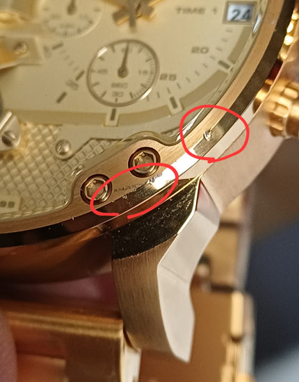 Detailed view of lug defect damage on all gold Diesel Mr. Daddy 2.0 watch