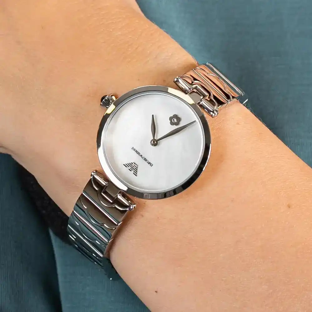 Emporio Armani AR11235 women's watch on wrist with mother of pearl dial and silver bracelet
