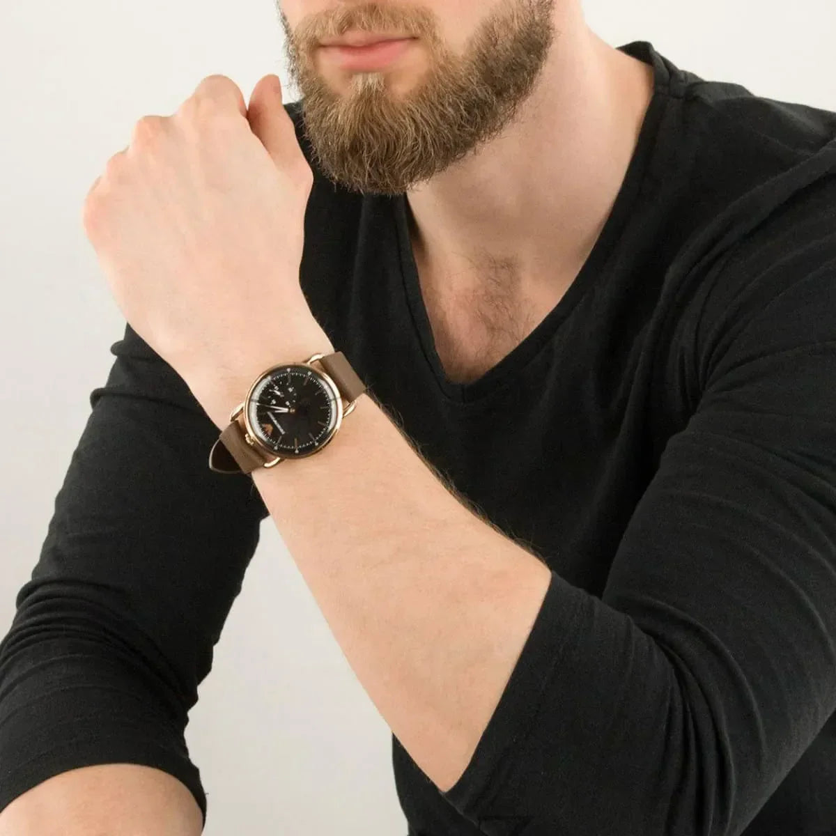 Emporio Armani AR11337 watch worn on wrist with black dial and brown leather