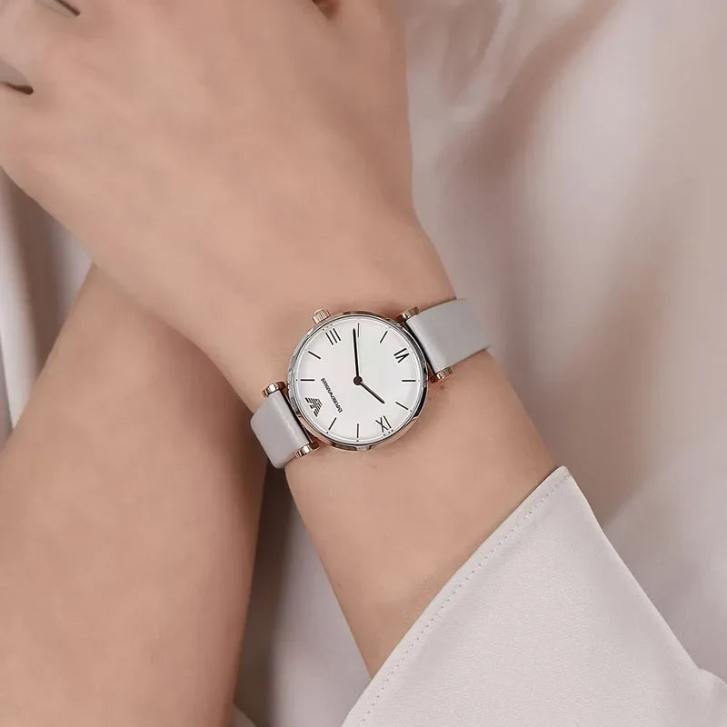Emporio Armani AR1965 watch worn on wrist showing white dial and gray leather band