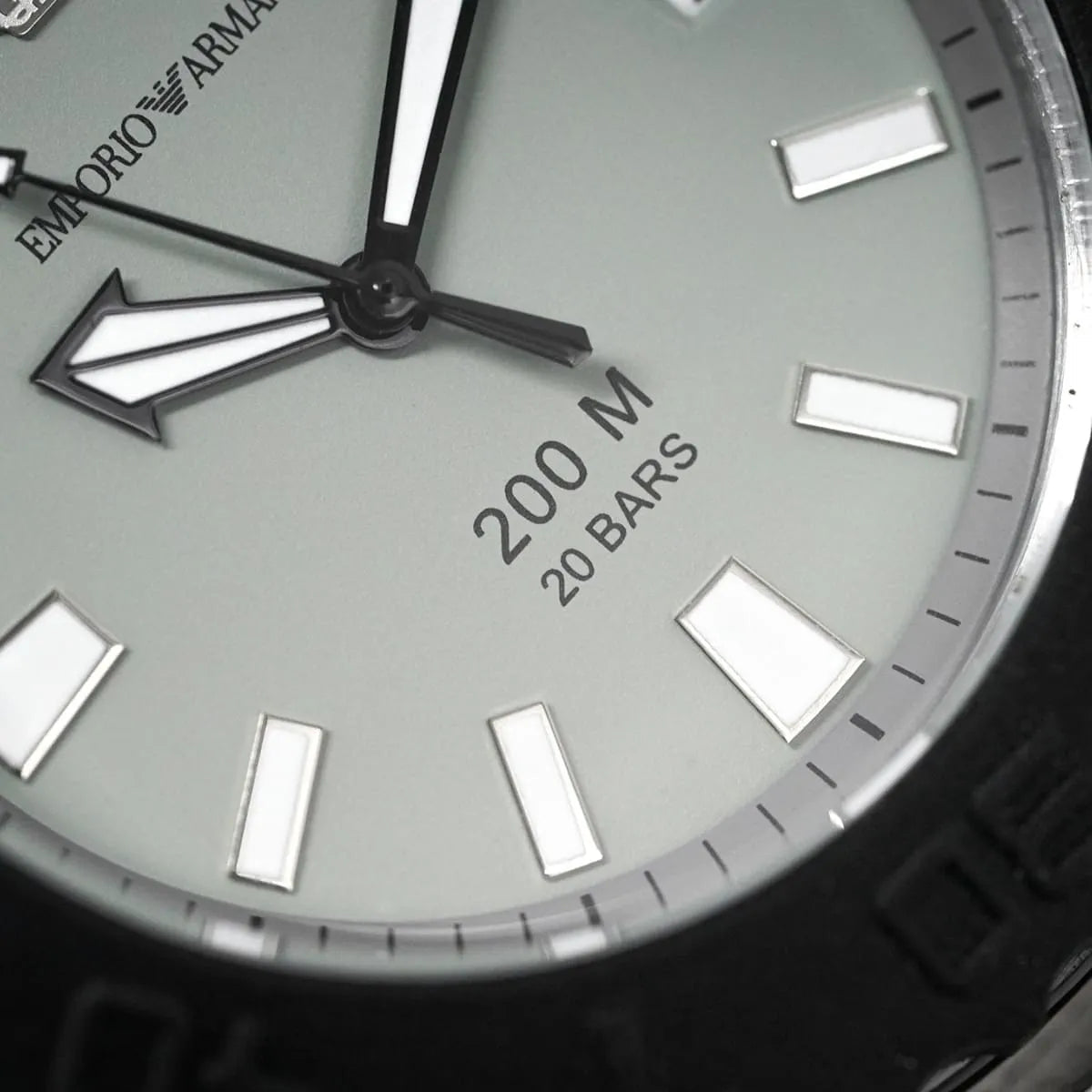 Close-up of AR5970 dial showing 200M 20 BARS water resistance, hour markers, and hands