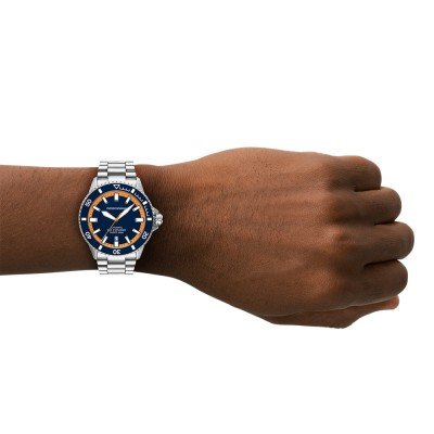 Emporio Armani Sea Explorer AR60090 automatic watch worn on wrist showing navy dial with orange accents
