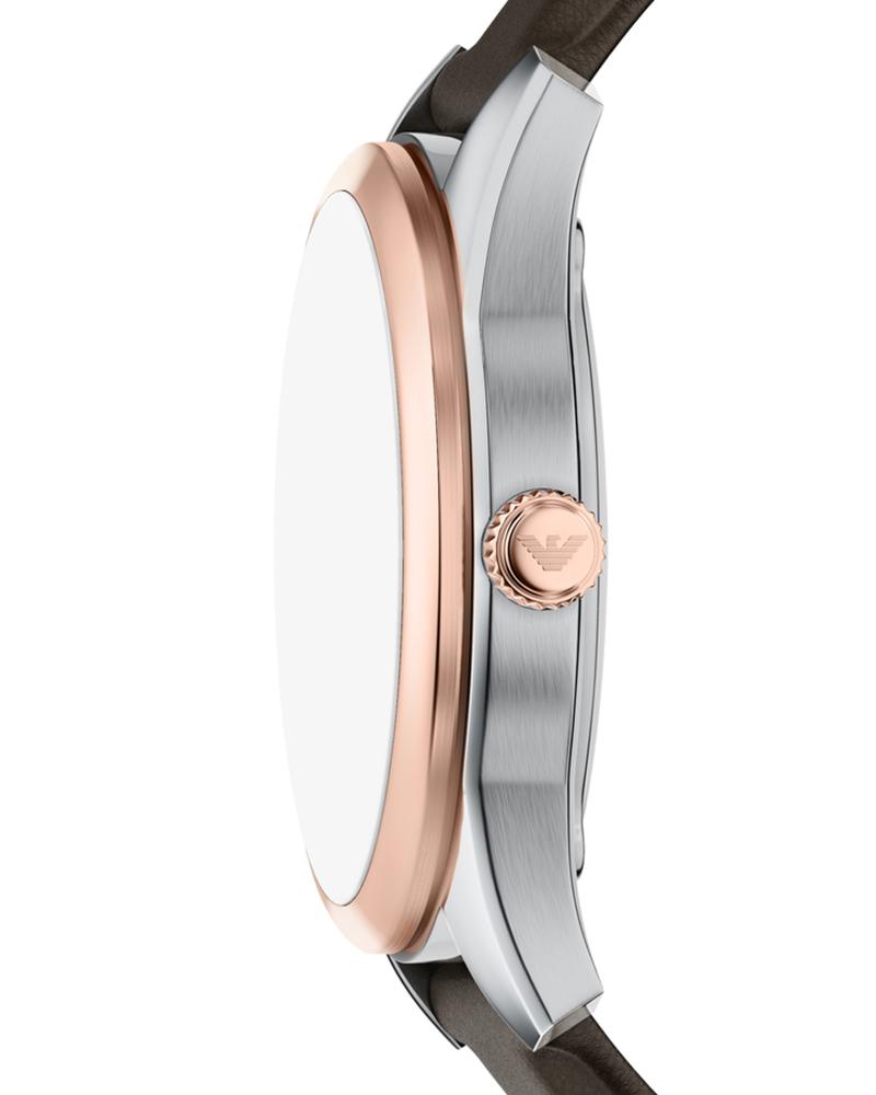 Side view showing two-tone stainless steel case with rose gold and silver finish and brown leather strap