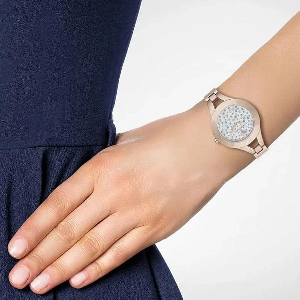 Emporio Armani Chiara watch worn on wrist with white dial and rose gold case