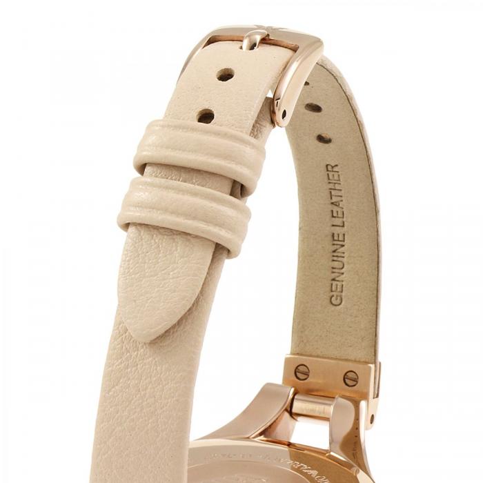 Genuine leather strap detail with rose gold hardware and adjustable buckle