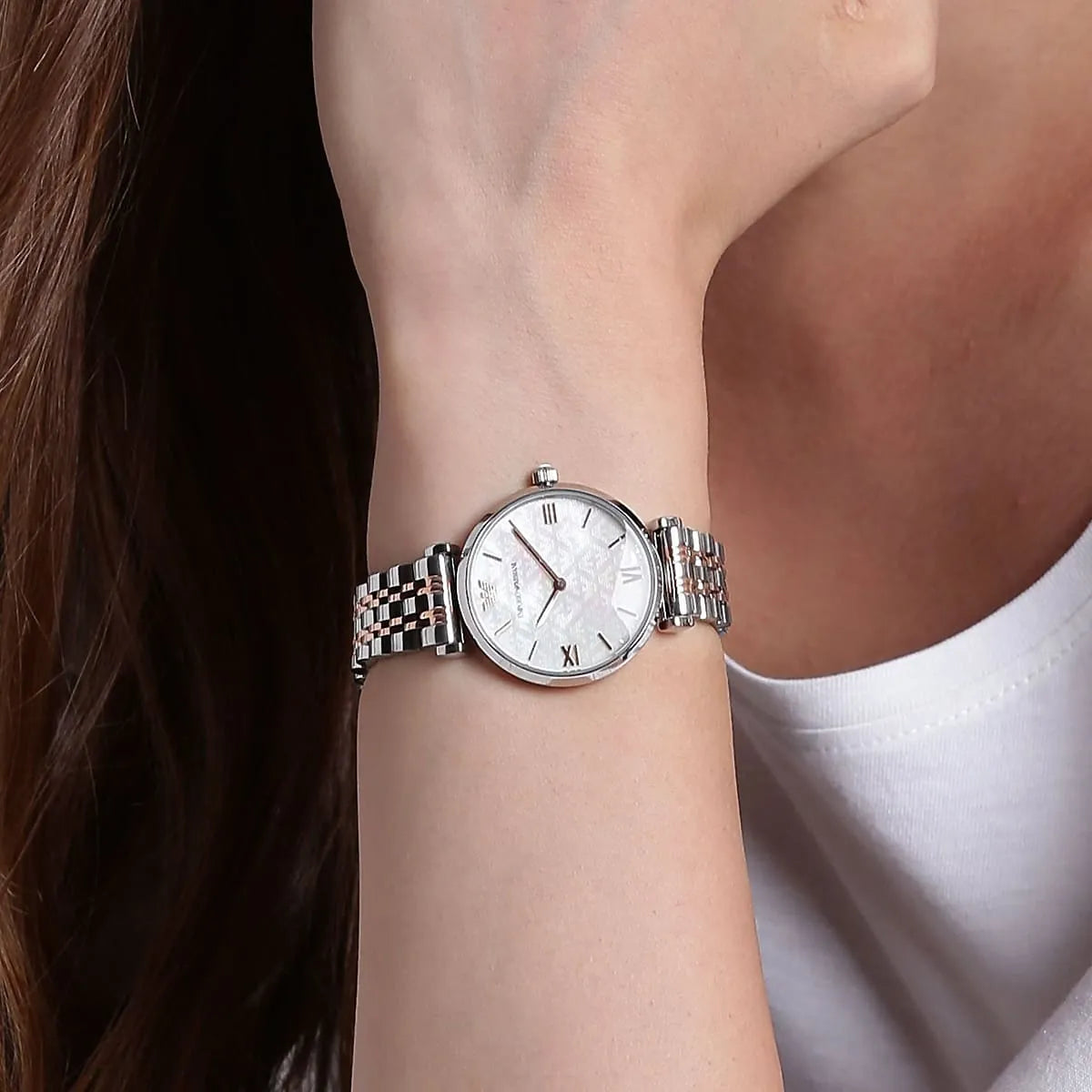 Emporio Armani AR1987 Gianni T-Bar watch worn on wrist with white patterned dial