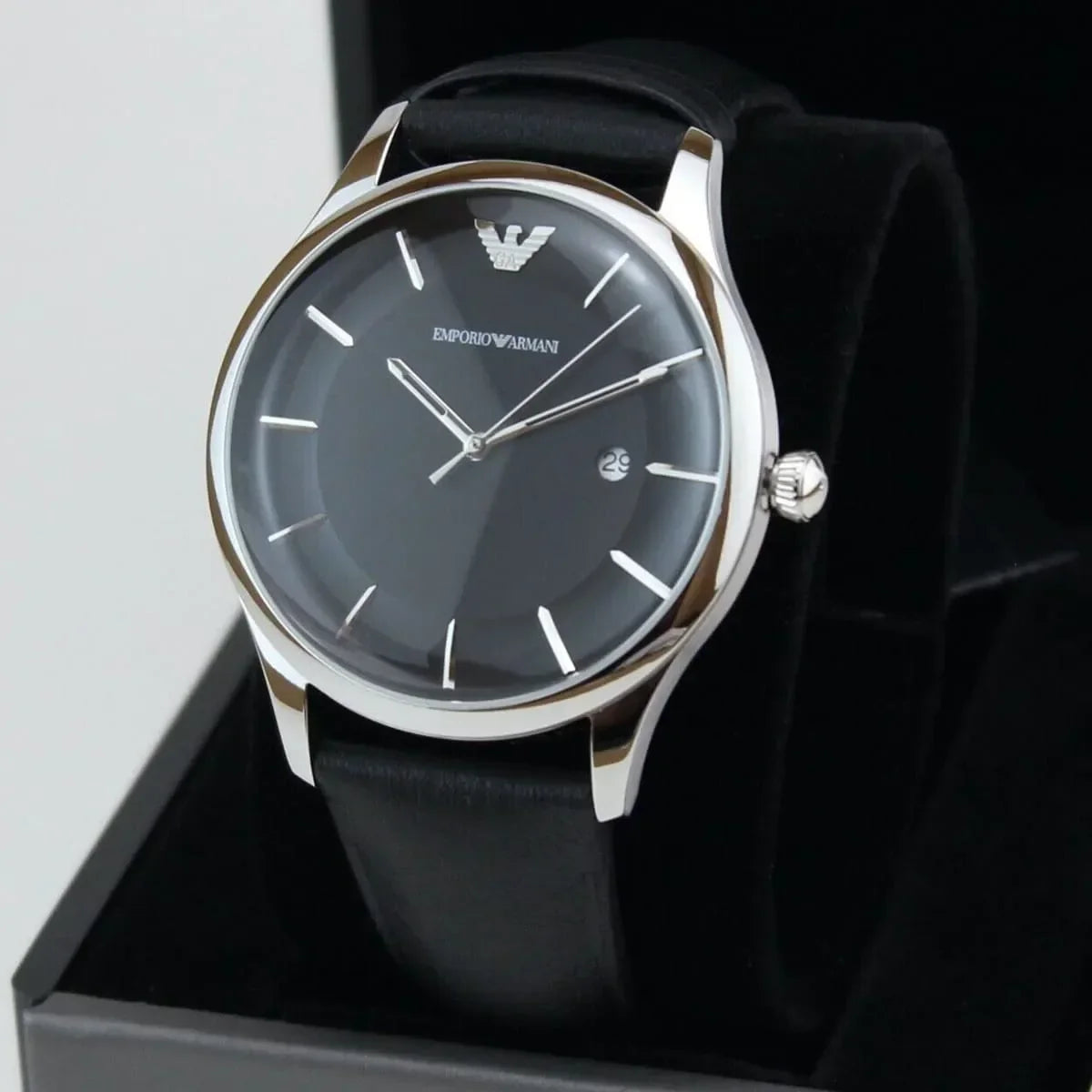 Emporio Armani Lambda AR11020 watch displayed on stand with black leather strap