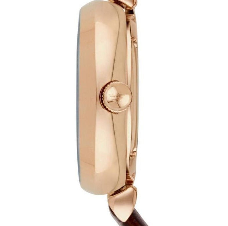 Side view of Emporio Armani Meccanico rose gold case with brown leather strap and crown detail