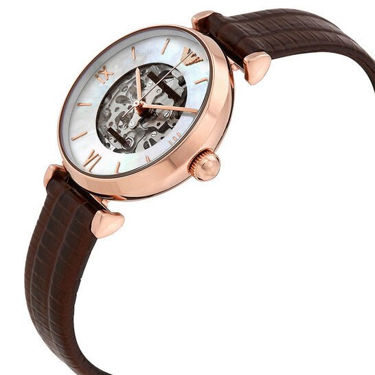 Side profile of Emporio Armani Meccanico watch with visible skeleton movement and rose gold lugs
