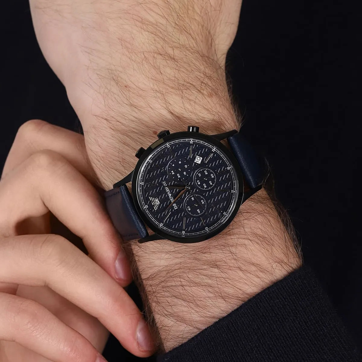 Emporio Armani Renato AR2481 blue chronograph watch worn on wrist with blue leather strap