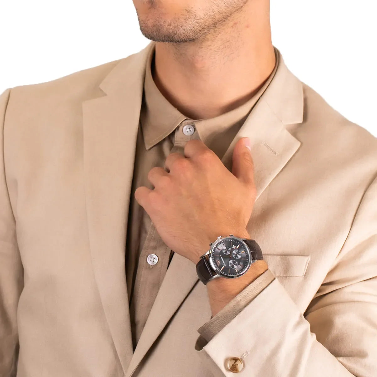 Emporio Armani Renato chronograph watch worn on wrist with grey dial and brown leather strap
